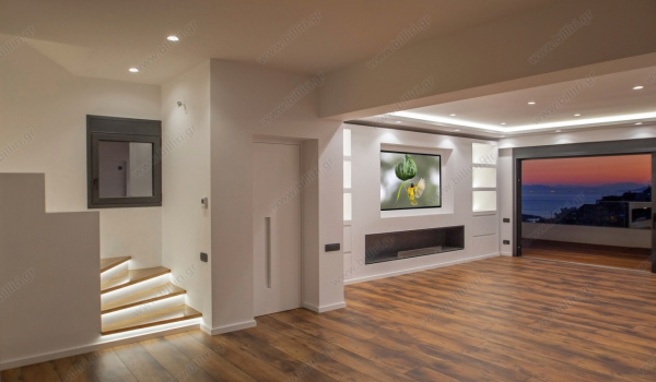 23_living_room_stairs_to_top_and_elevator_door_1280229520